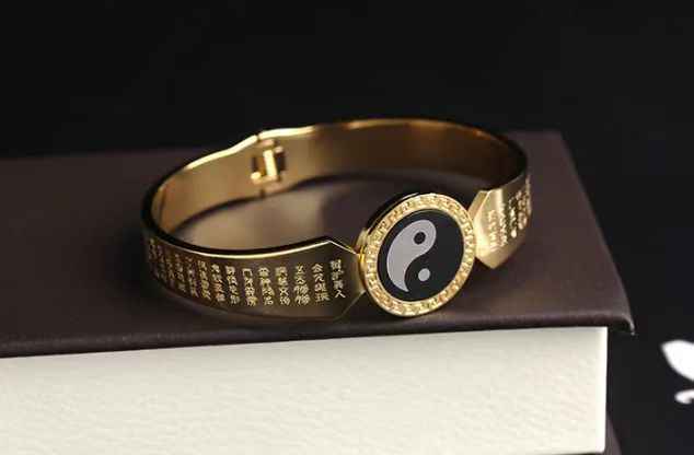 Golden Light Titanium Steel Taiji Bangle – Spiritual Armor & Modern Elegance