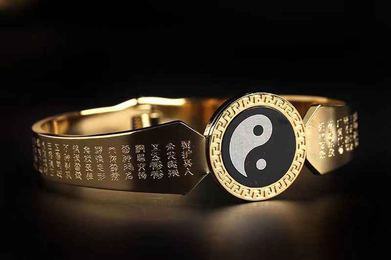 Golden Light Titanium Steel Taiji Bangle – Spiritual Armor &amp; Modern Elegance